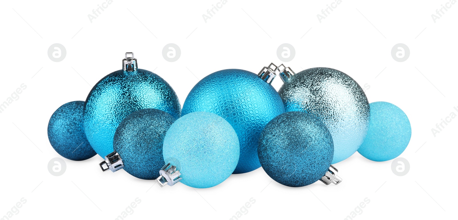 Photo of Beautiful light blue Christmas balls isolated on white