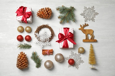 Photo of Flat lay composition with Christmas decor on light background. Festive winter design