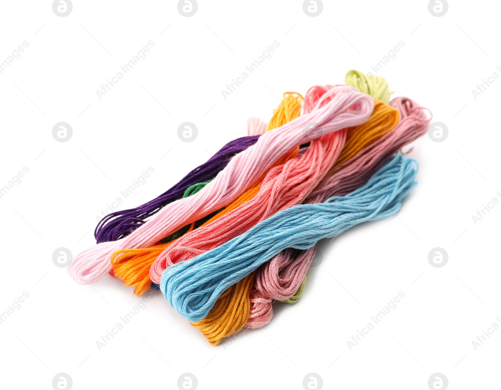 Photo of Colorful embroidery floss set on white background