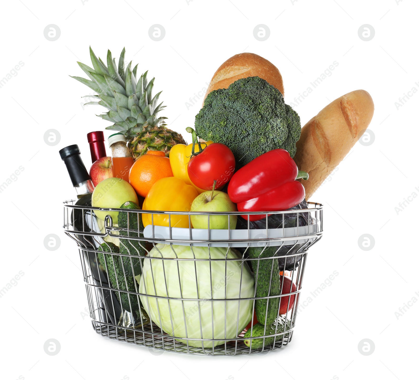 Photo of Shopping basket with grocery products on white background