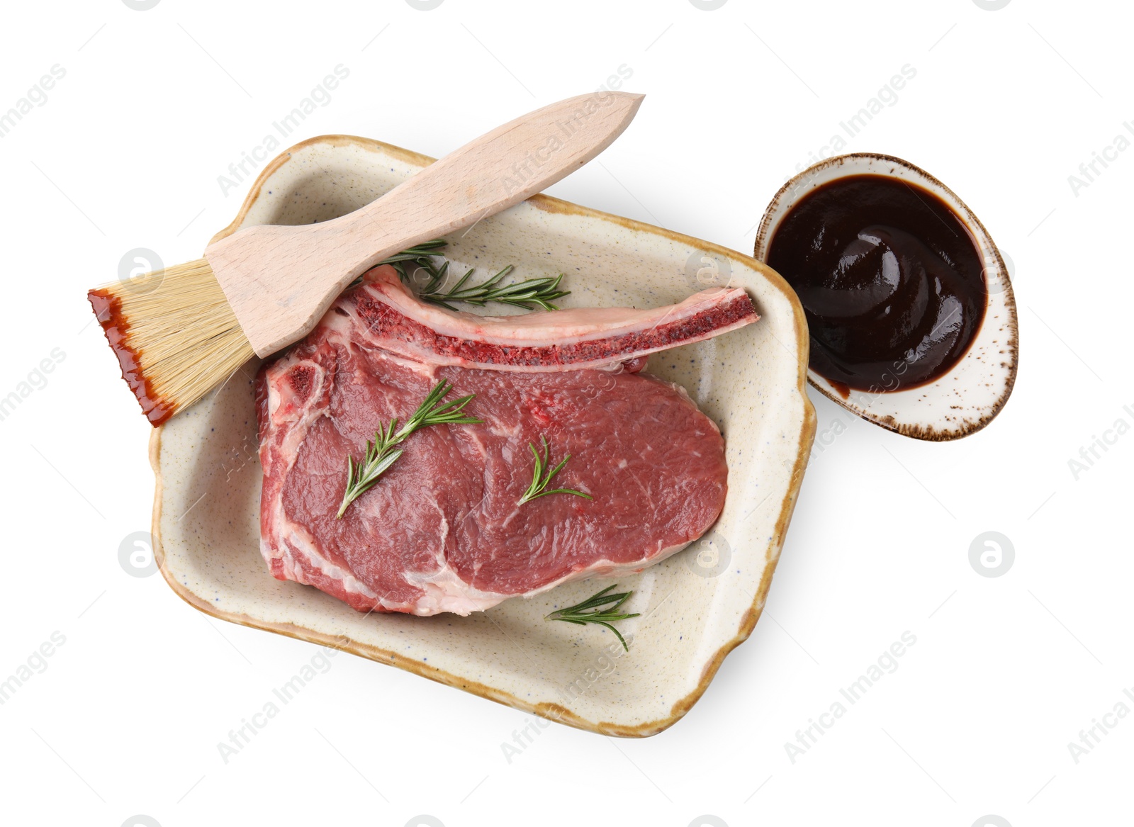 Photo of Raw meat, rosemary and brush with marinade isolated on white, top view