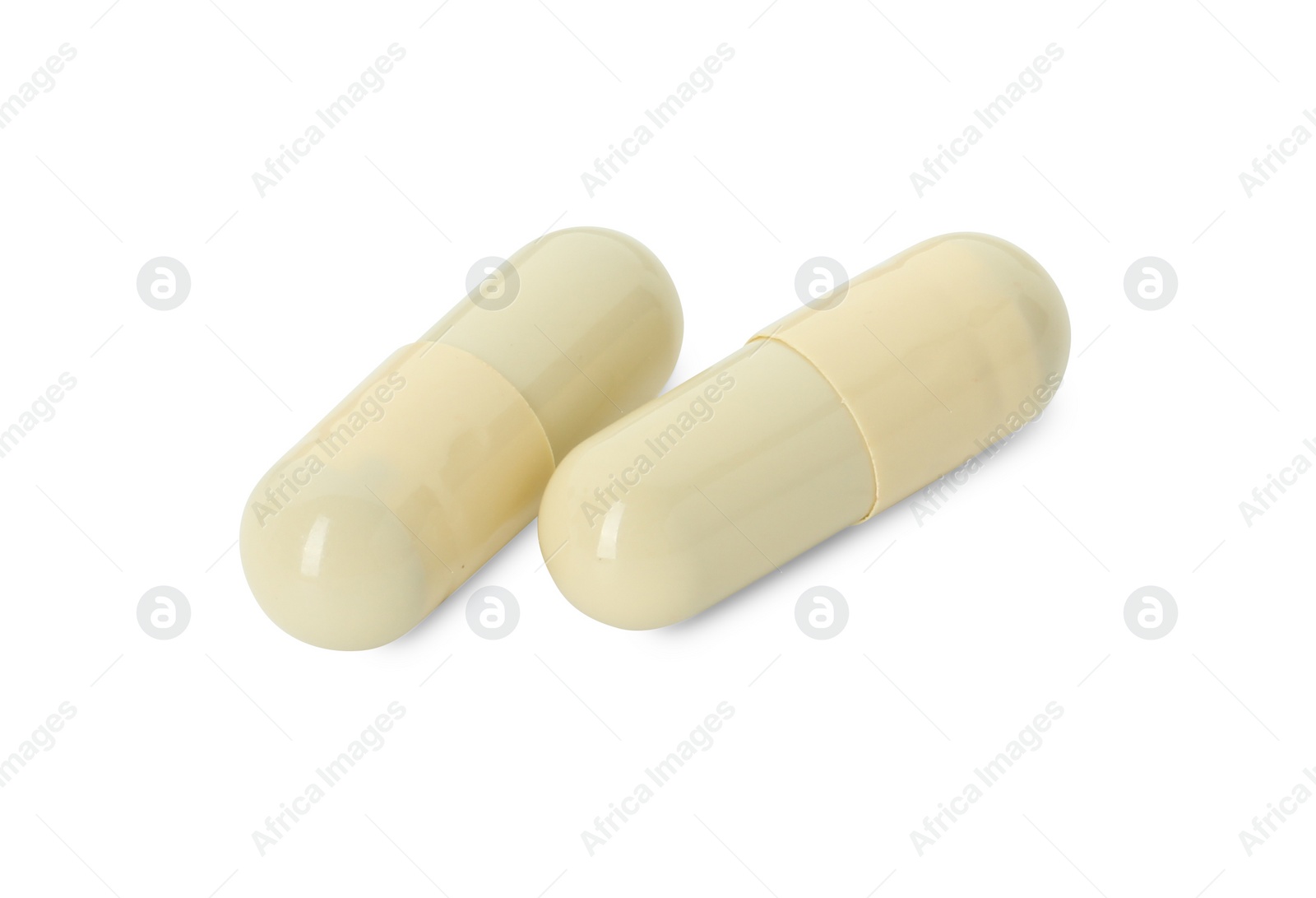 Photo of Vitamin capsules isolated on white. Health supplement