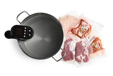 Photo of Thermal immersion circulator in pot and meat on white background, top view. Vacuum packing for sous vide cooking