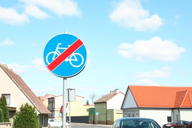 Photo of Traffic sign End Of Cycleway on city street, space for text
