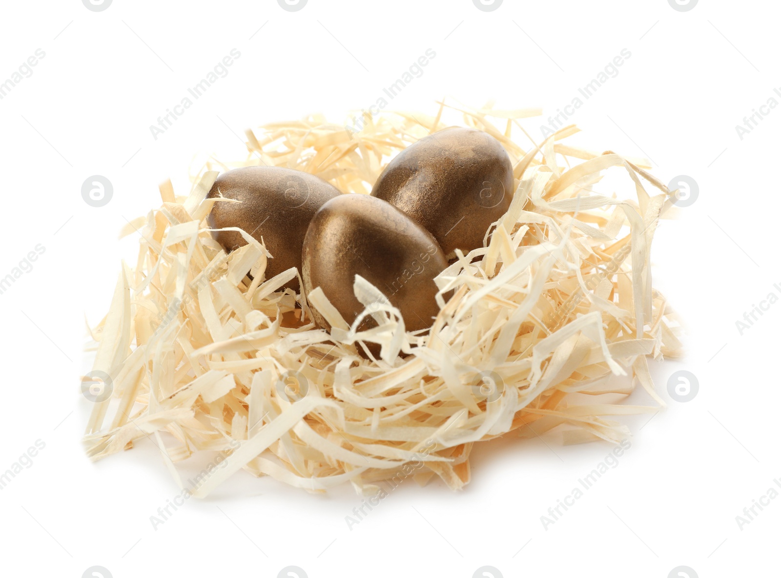 Photo of Nest with golden eggs on white background. Pension concept