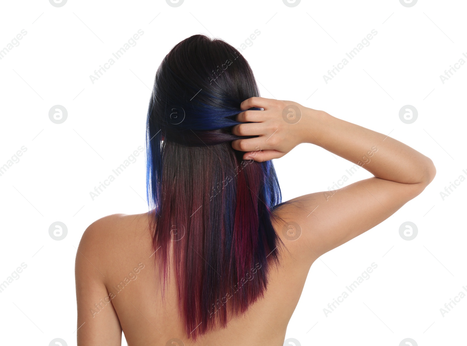 Photo of Young woman with bright dyed hair on white background, back view