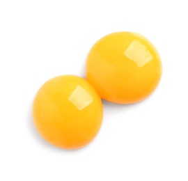 Photo of Raw egg yolks on white background, top view