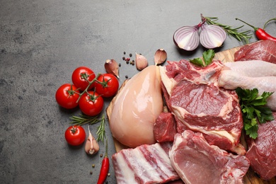 Image of Flat lay composition with fresh meat on grey table 