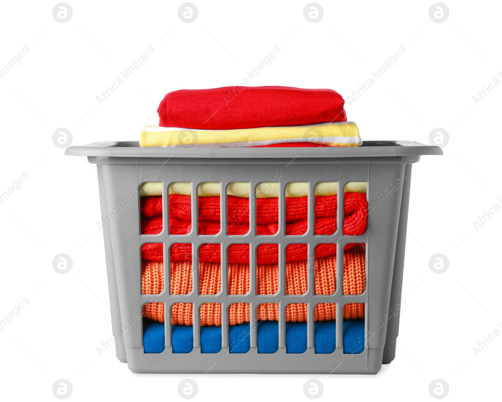 Photo of Plastic laundry basket with clean clothes isolated on white