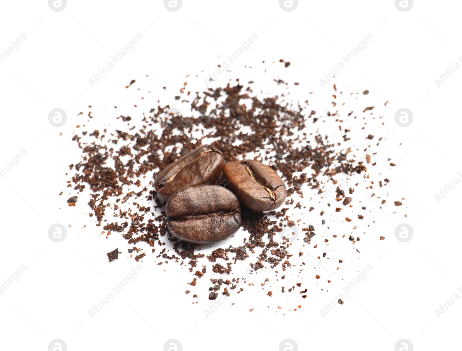 Photo of Coffee grounds and roasted beans on white background