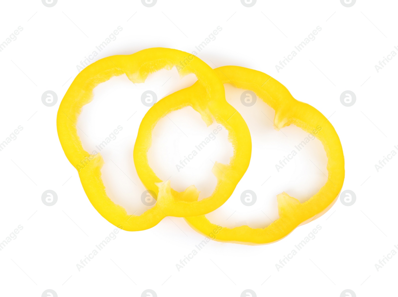 Photo of Rings of yellow bell pepper isolated on white, top view