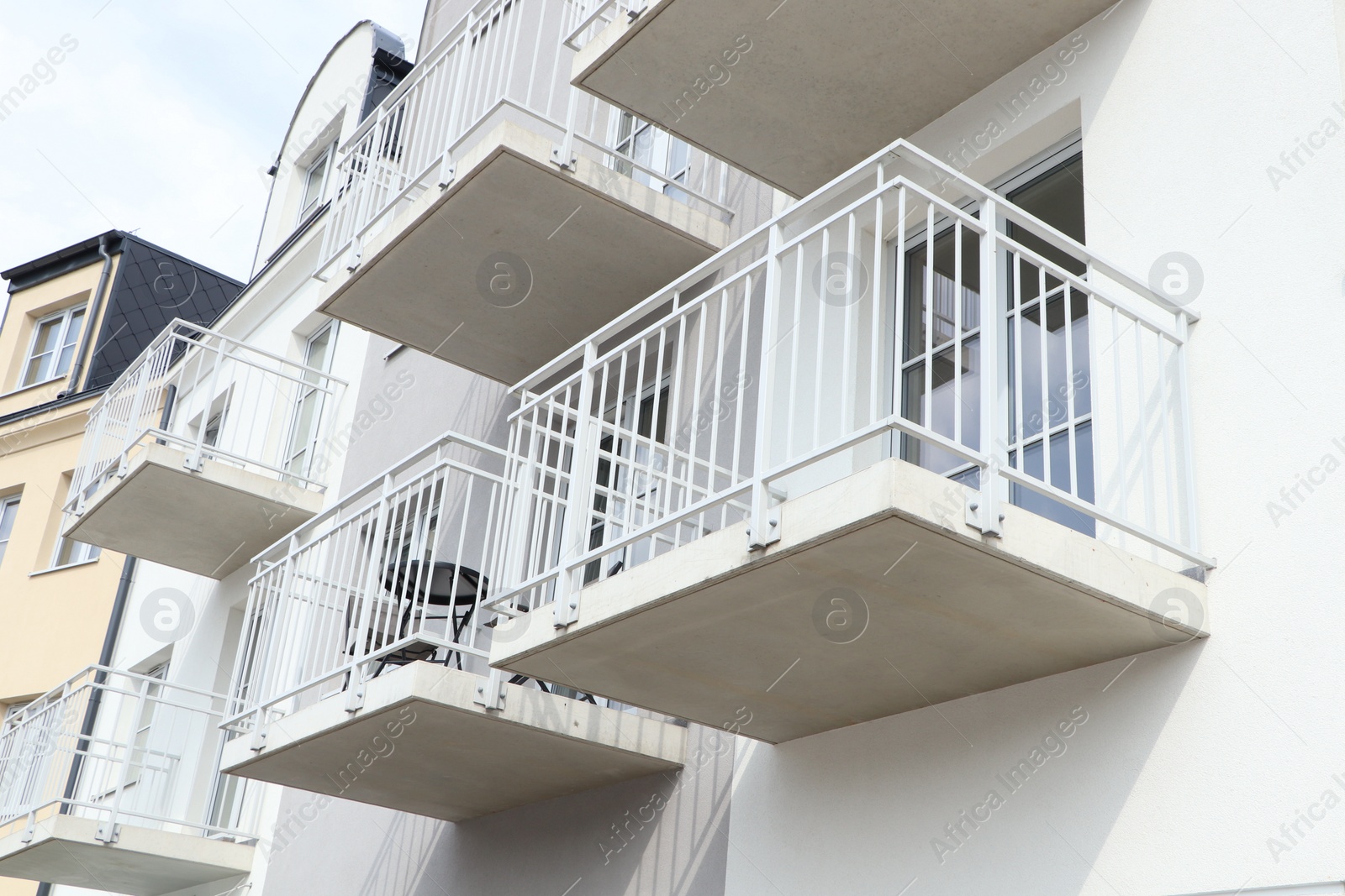 Photo of Exterior of beautiful building with empty balconies