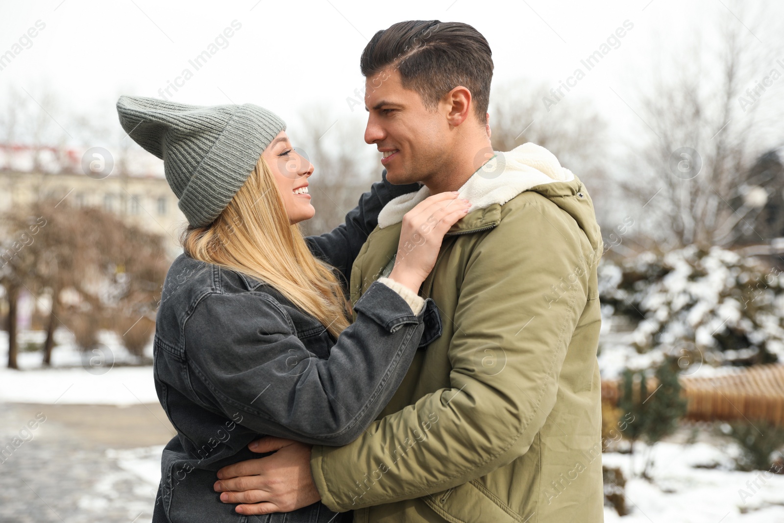 Photo of Beautiful happy couple outdoors on winter day