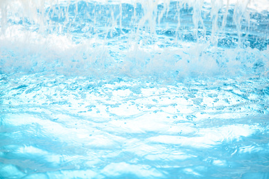 Photo of View of water splashing in swimming pool