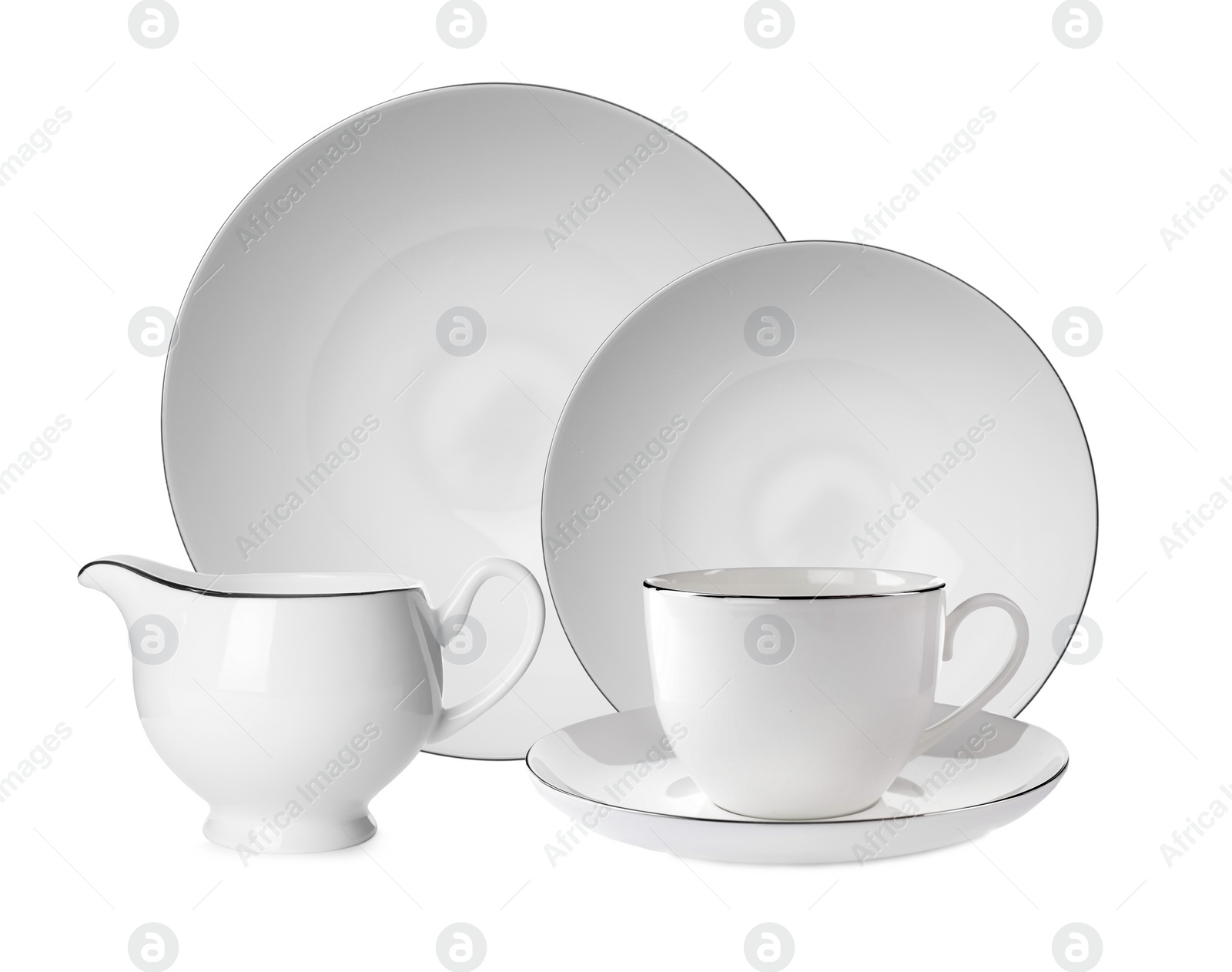 Image of Set of beautiful ceramic dinnerware on white background