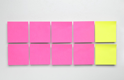 Photo of Flat lay composition with sticky notes on white background. Pareto principle concept