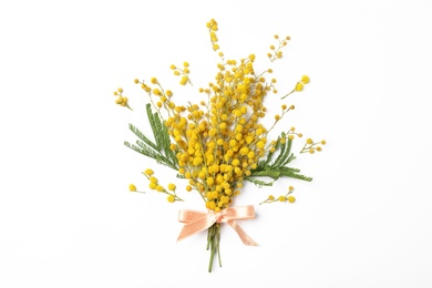 Photo of Bouquet of beautiful mimosa flowers on white background, top view