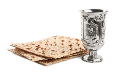 Photo of Traditional matzos and wine on white background