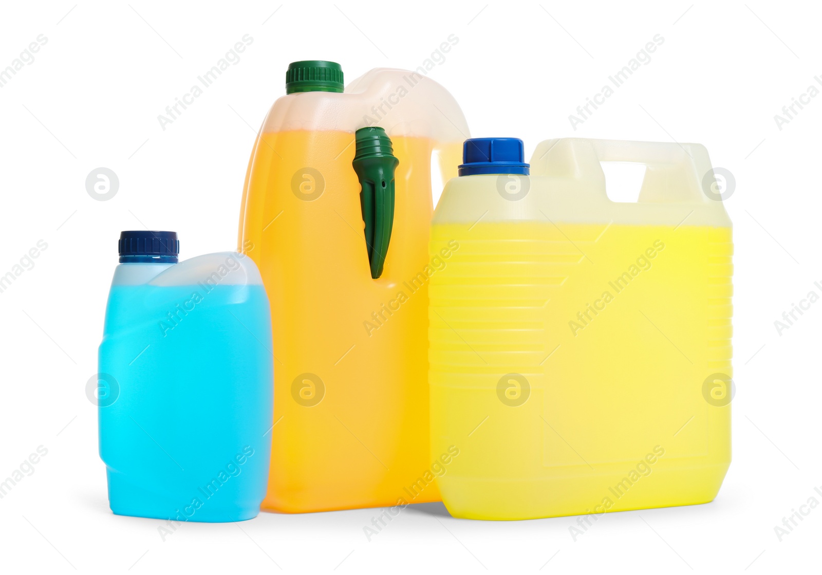 Photo of Plastic canisters with different liquids for car on white background