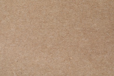 Texture of kraft paper sheet as background, closeup