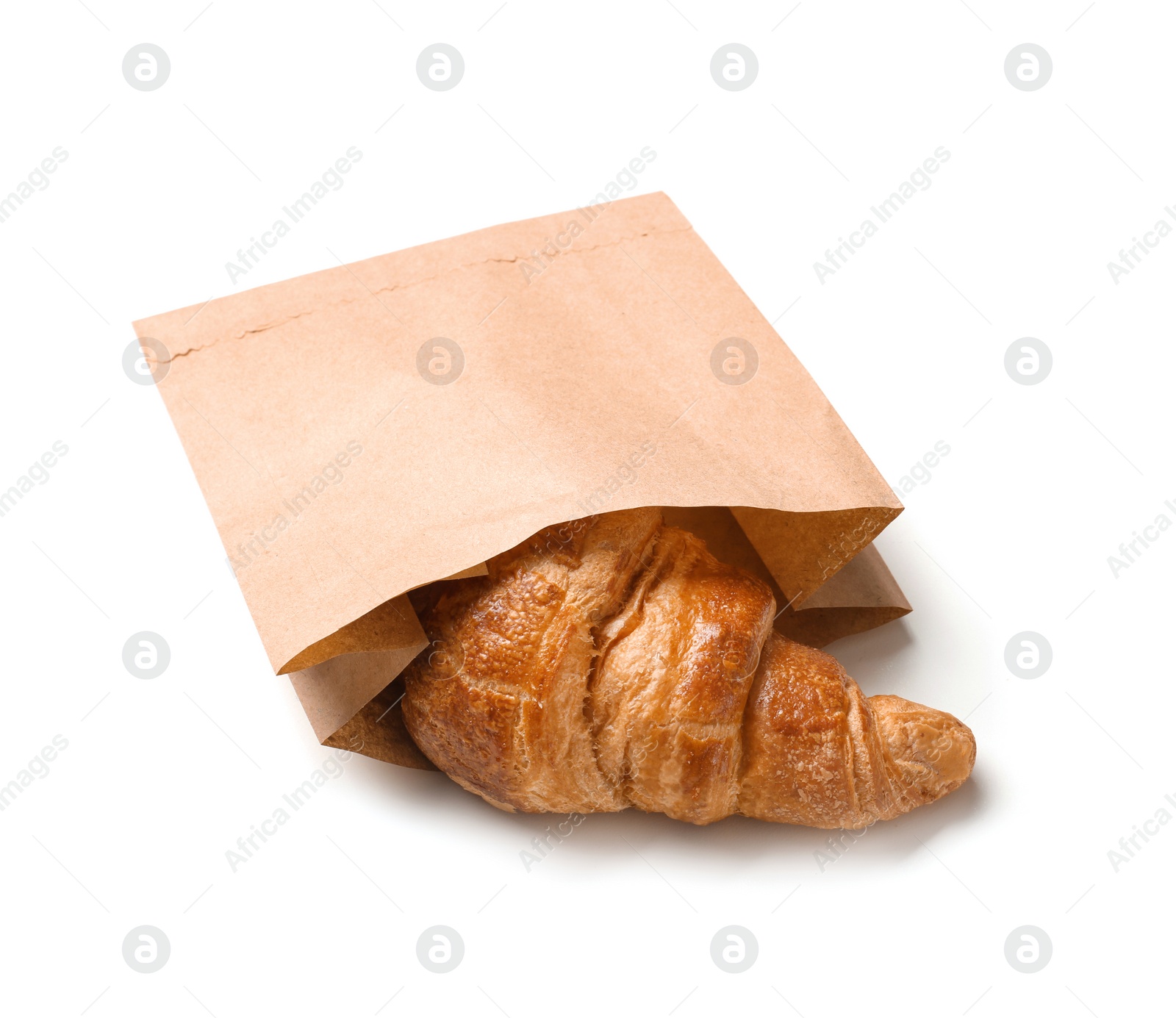 Photo of Paper bag with croissant on white background. Space for design