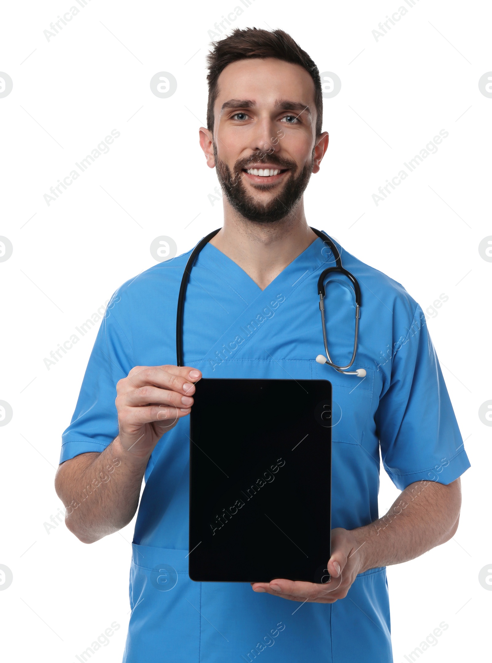 Photo of Doctor with stethoscope holding blank tablet on white background, space for design. Cardiology concept