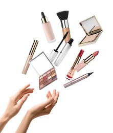 Image of Woman making decorative cosmetics levitate on white background, closeup. Makeup products