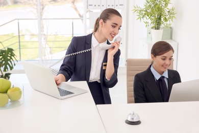 Female receptionists at workplace in hotel