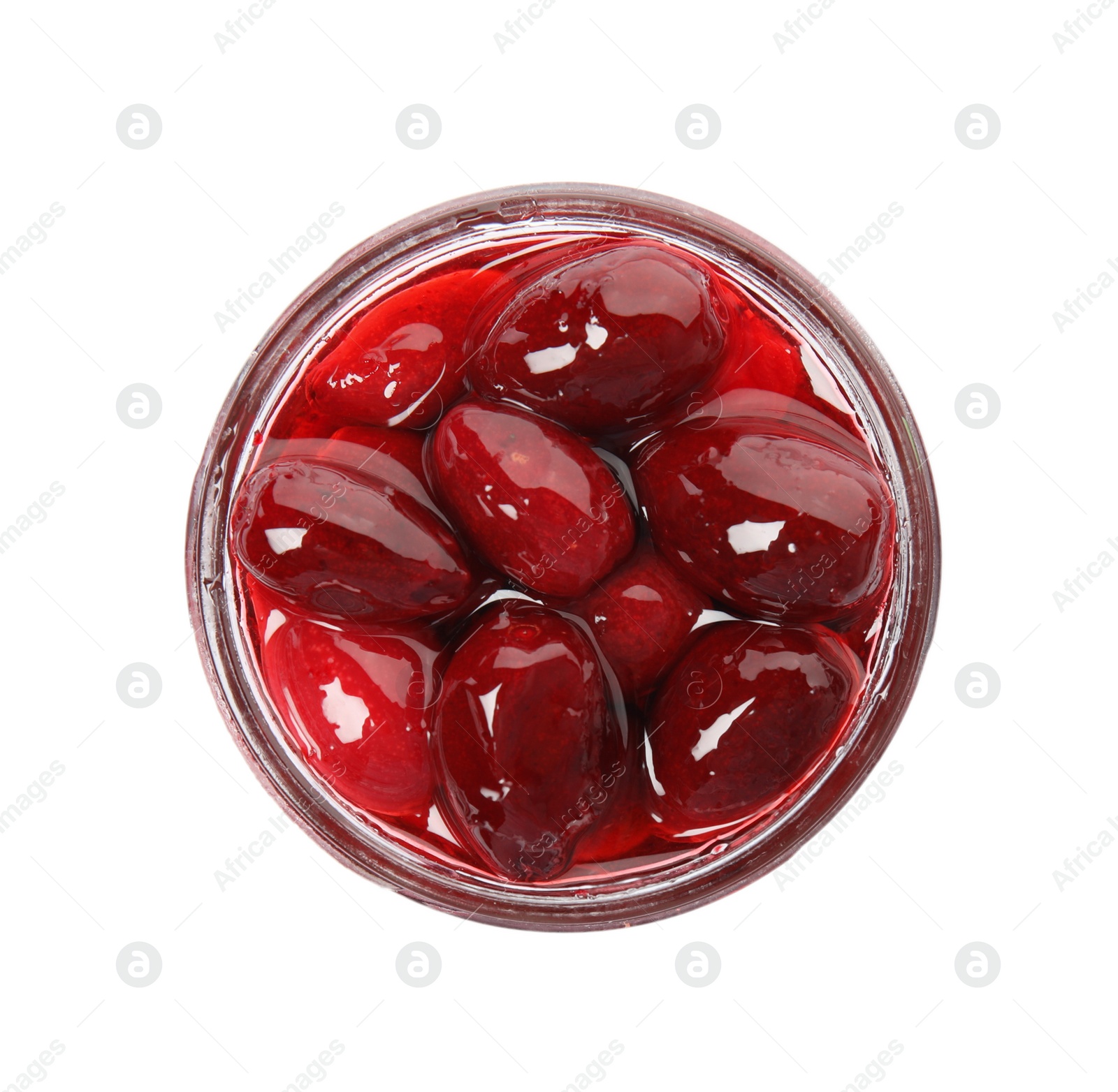 Photo of Delicious dogwood jam with berries in glass jar isolated on white, top view