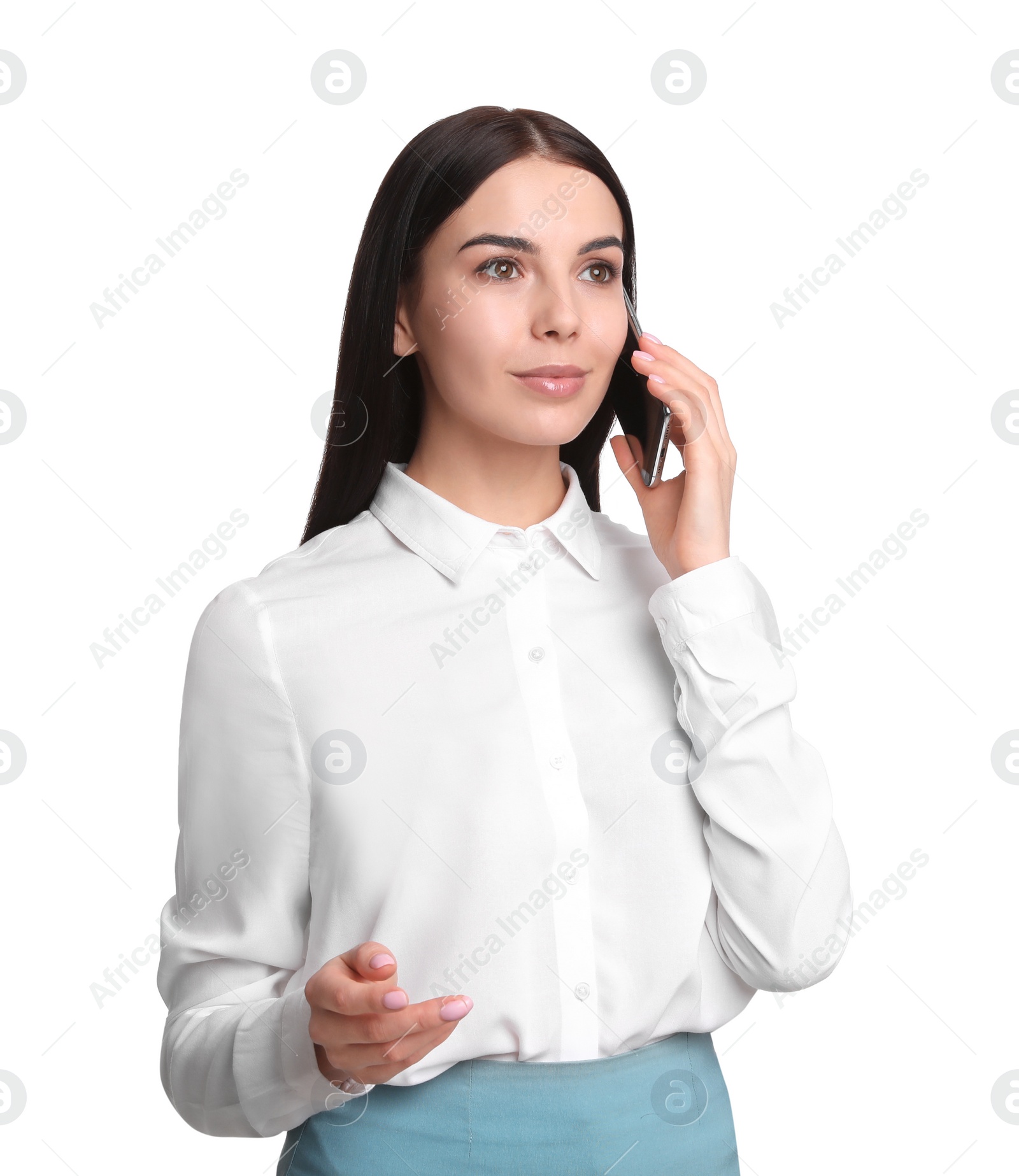 Photo of Young businesswoman talking on mobile phone against white background