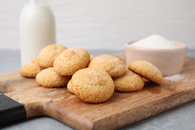 Photo of Tasty fresh sugar cookies on grey table, closeup