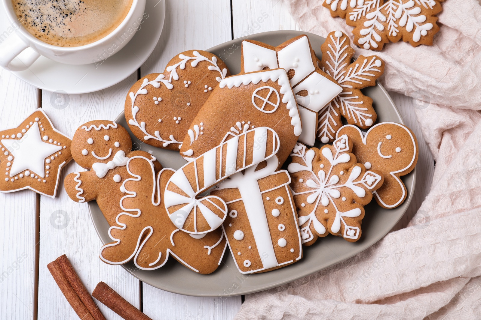 Photo of Delicious Christmas cookies on white wooden table, flat lay