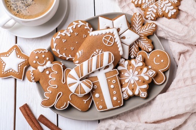 Delicious Christmas cookies on white wooden table, flat lay