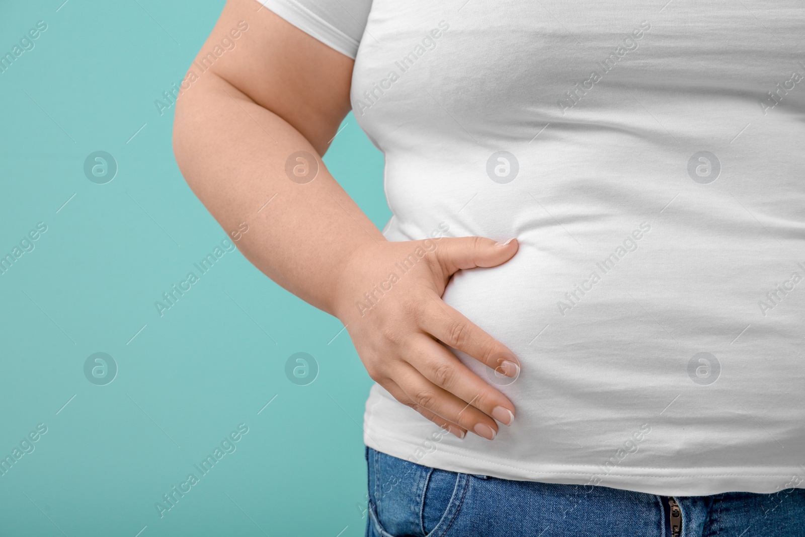Photo of Overweight woman on color background