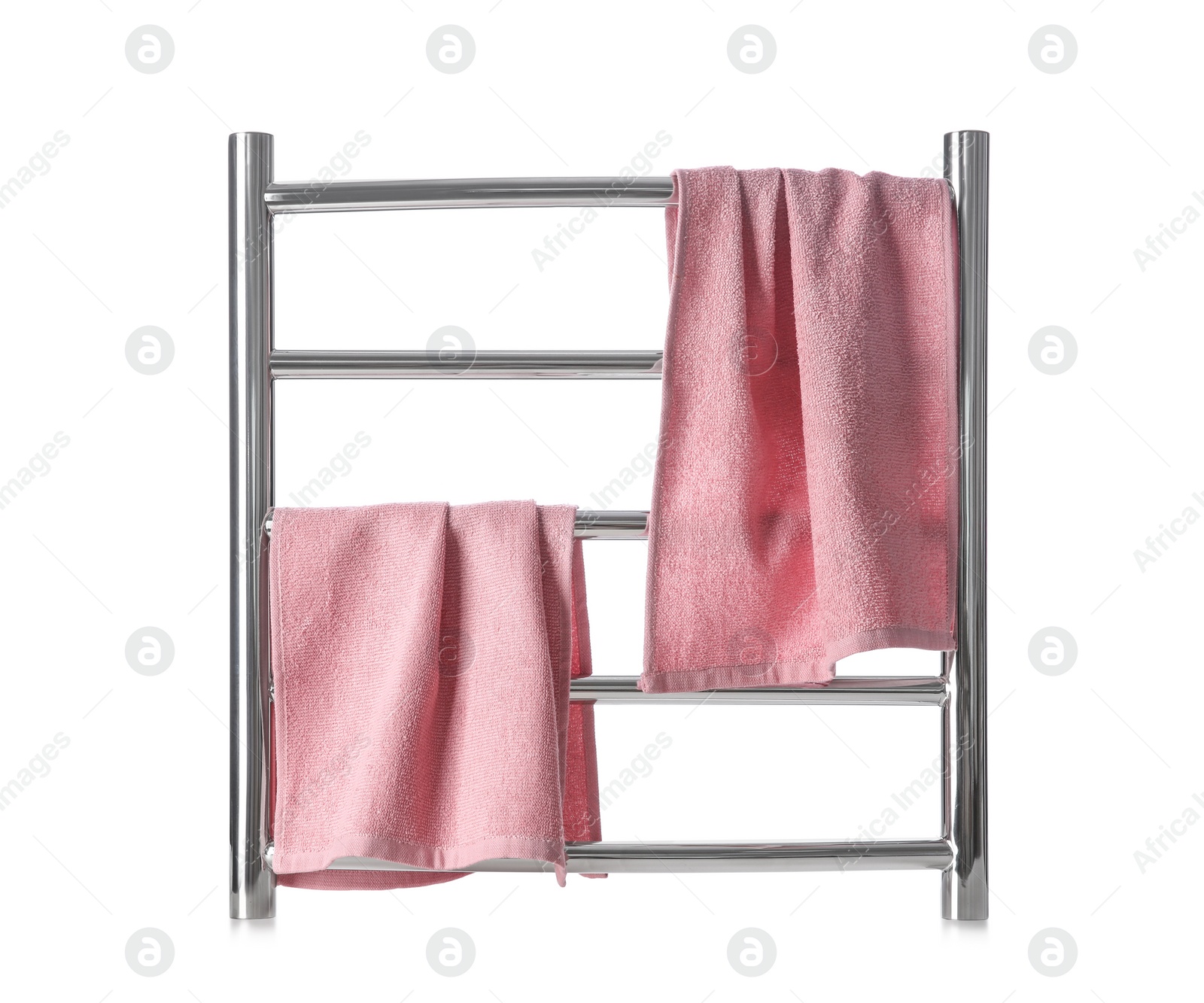 Photo of Modern heated towel rail with warm soft towels isolated on white