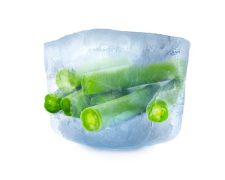 Frozen food. Raw green beans in ice cube isolated on white
