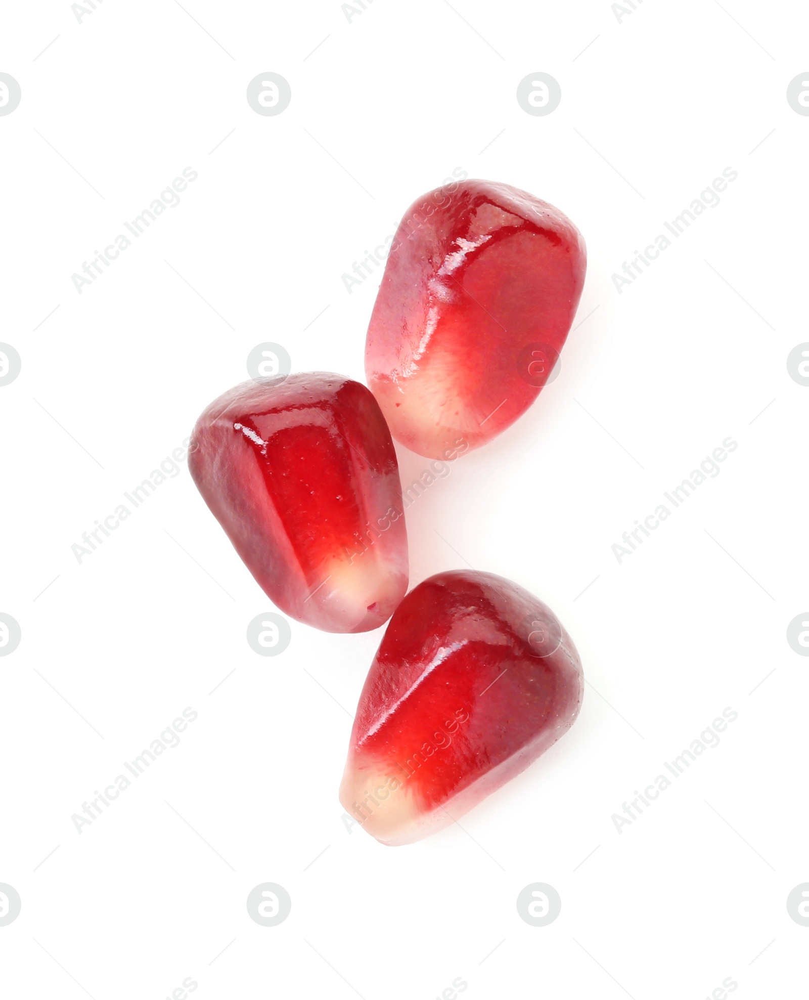 Photo of Ripe juicy pomegranate grains isolated on white, top view