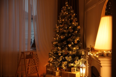 Photo of Beautiful room interior with Christmas tree and gifts
