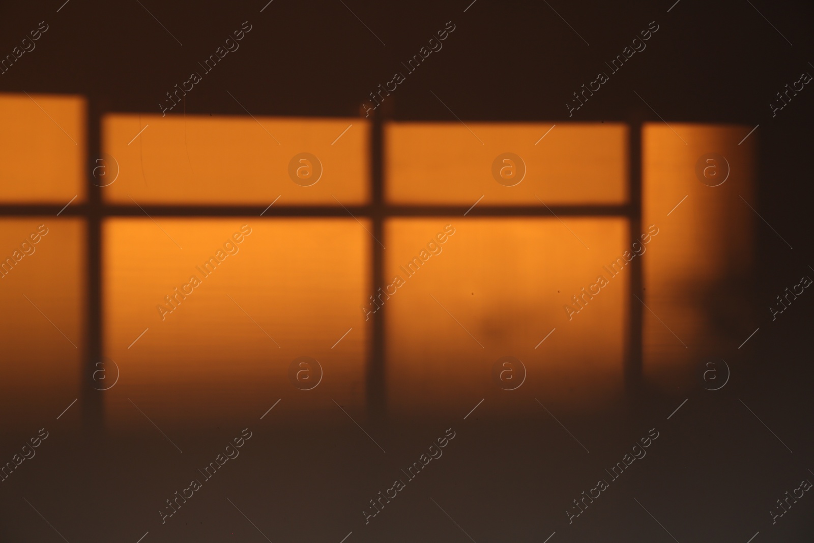 Photo of Light and shadow from window on wall