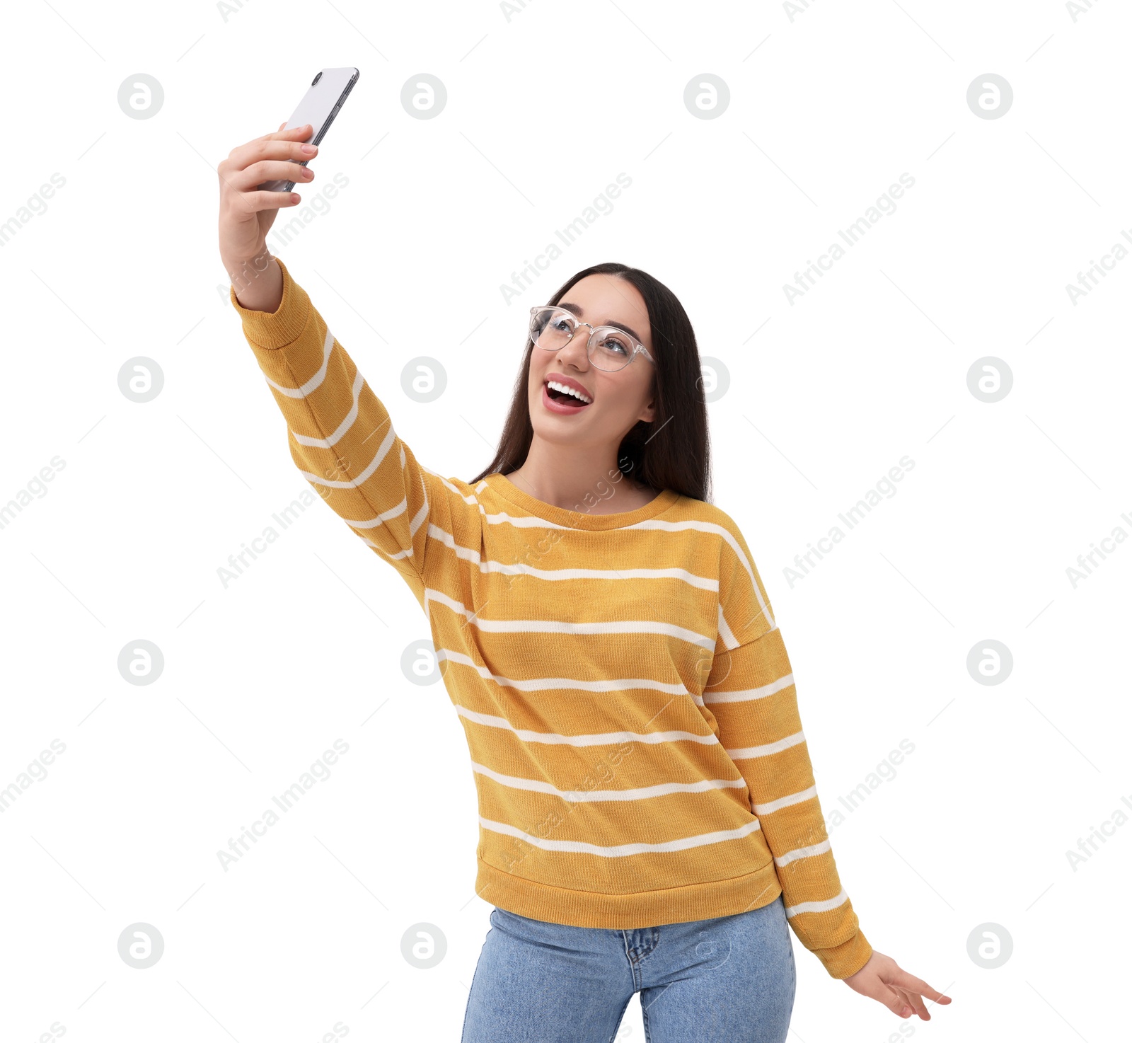 Photo of Smiling young woman taking selfie with smartphone on white background