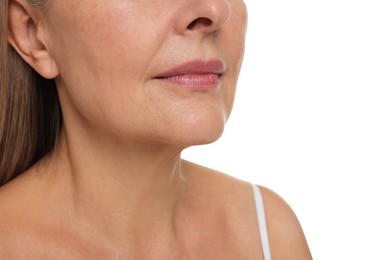 Mature woman with healthy skin on white background, closeup