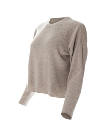 Photo of Stylish sweater on mannequin against white background. Women's clothes