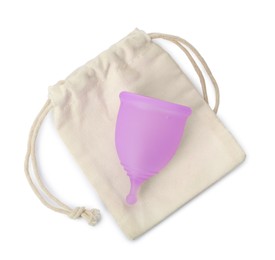 Photo of Silicone menstrual cup with cotton bag on white background, top view