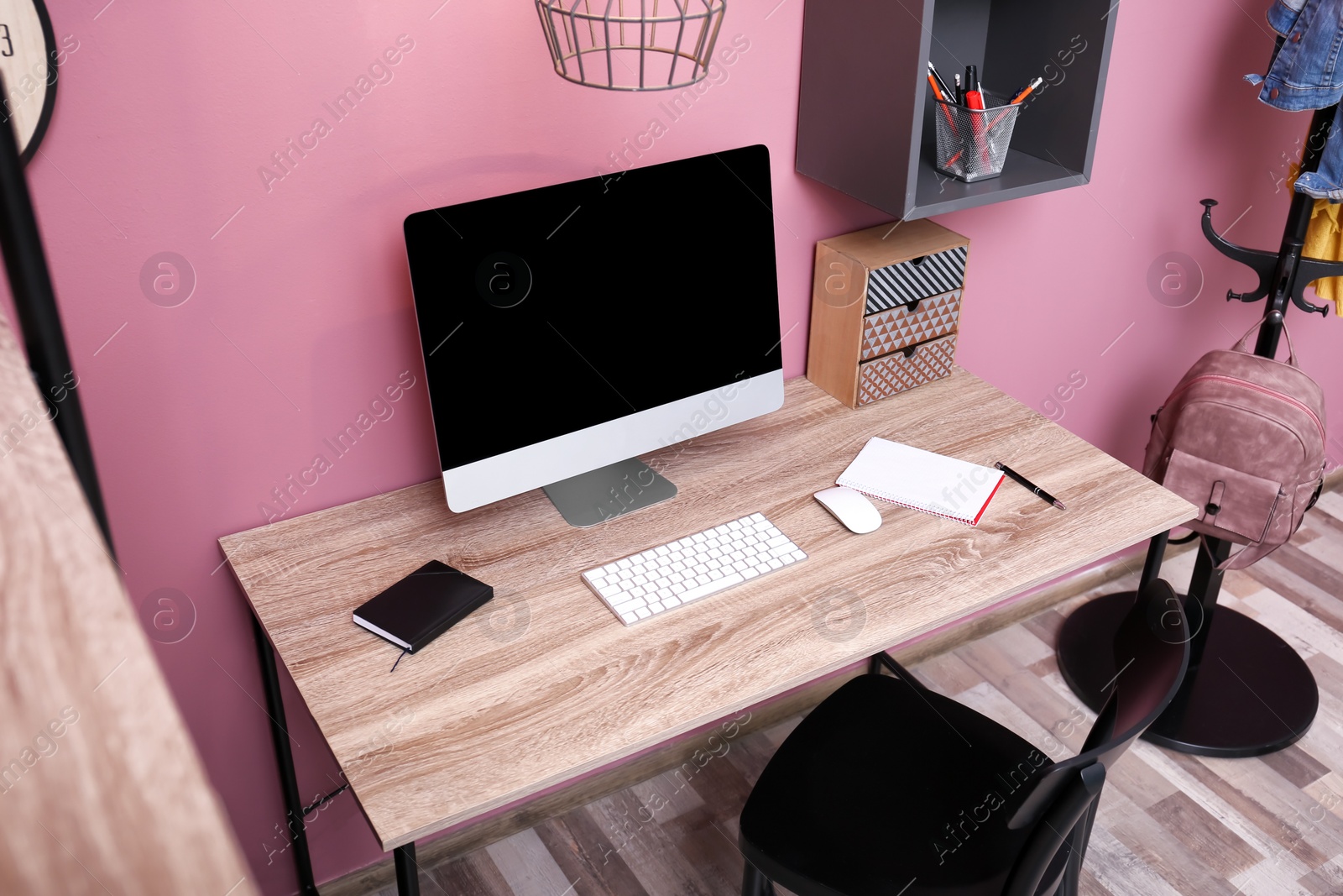 Photo of Comfortable workplace with computer on desk in home office