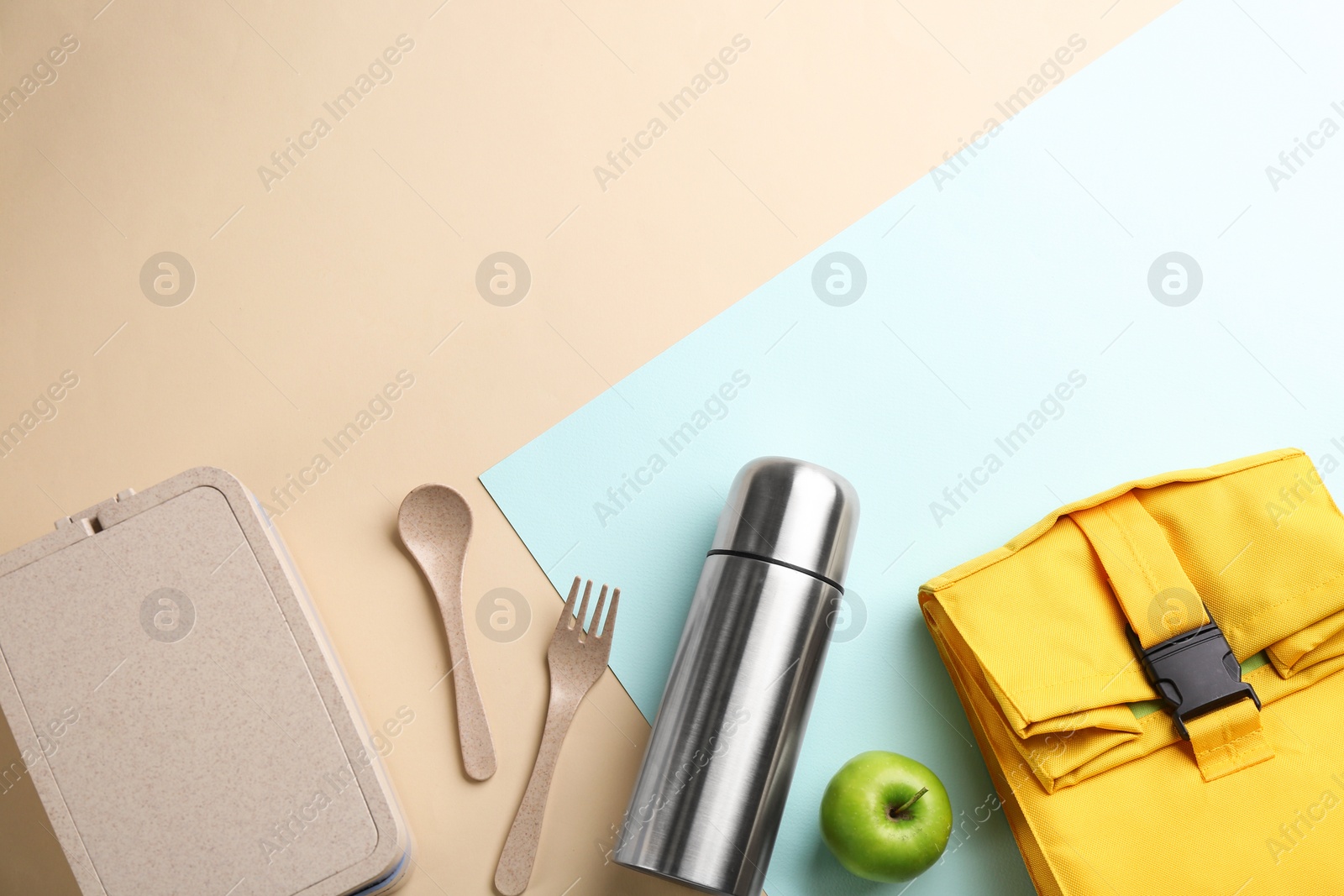 Photo of Flat lay composition with thermos on color background. Space for text