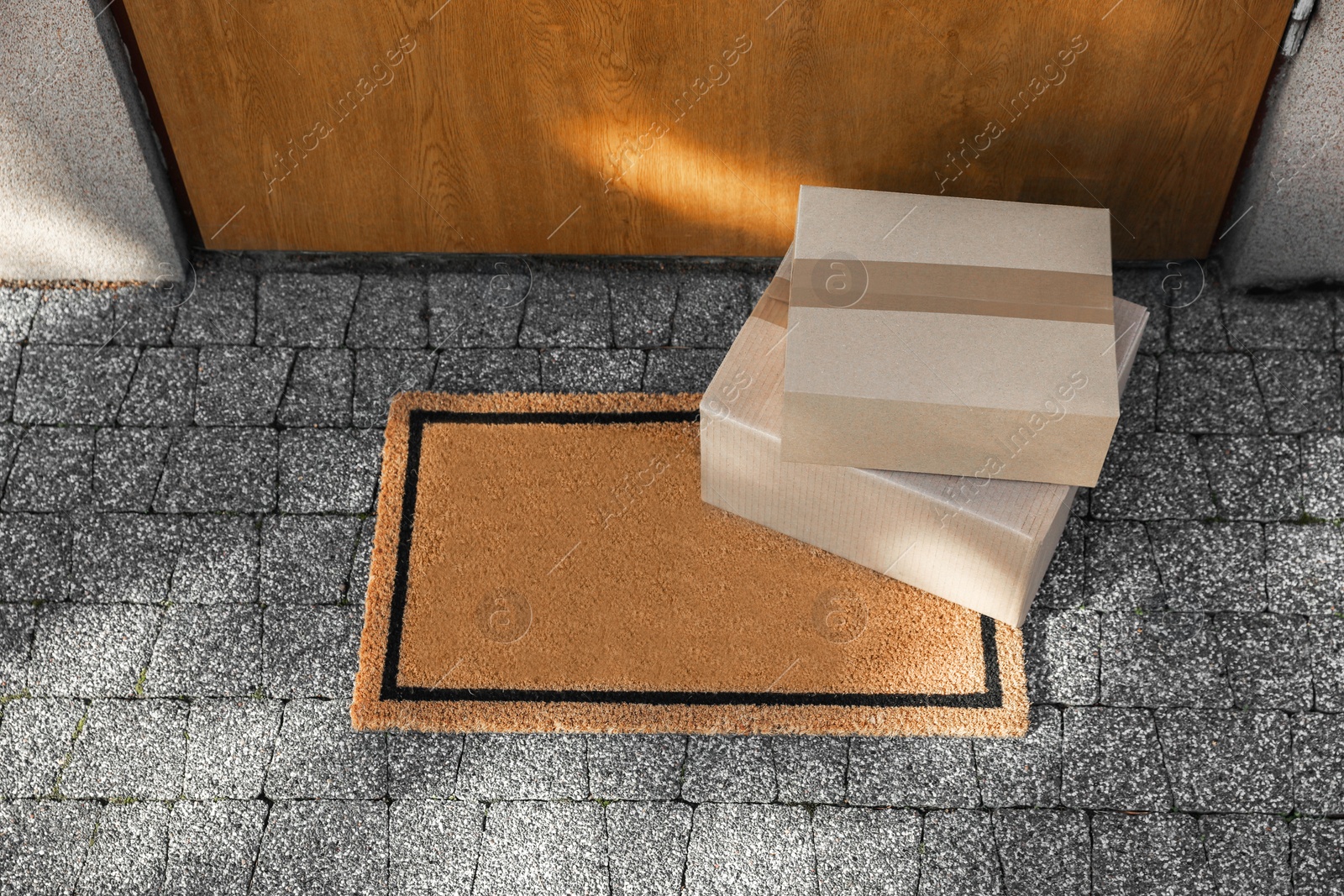 Photo of Stack of parcels delivered near front door