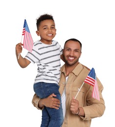 4th of July - Independence day of America. Happy man and his son with national flags of United States on white background