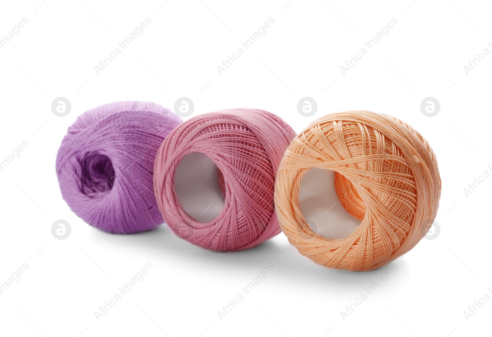 Photo of Color threads on white background