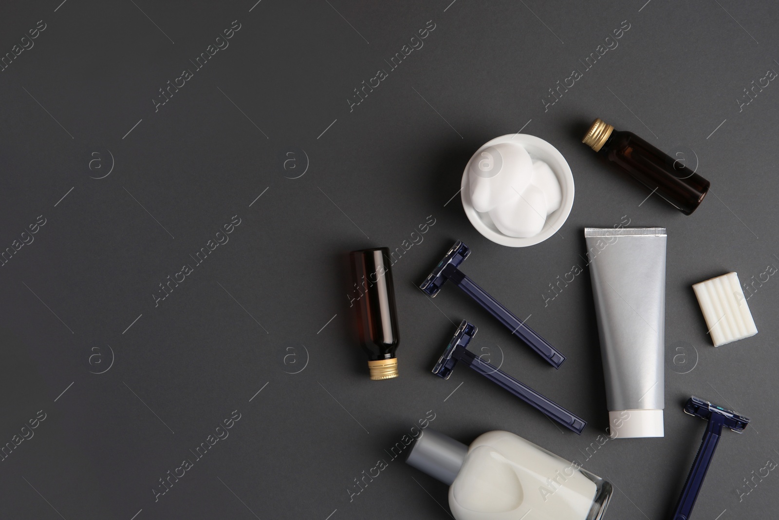 Photo of Flat lay composition with shaving accessories for men on grey background. Space for text