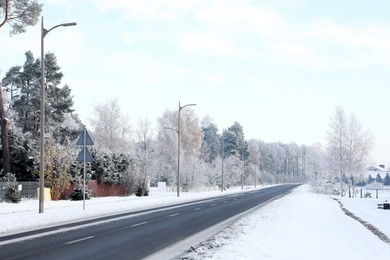 Photo of Beautiful view of road near forest in winter morning